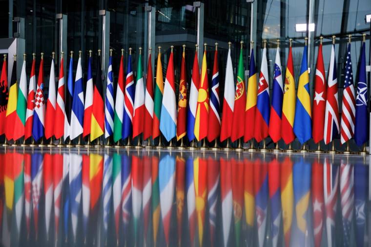 Les drapeaux des membres de l'Otan à Bruxelles, en Belgique, le 3 avril 2024. ( AFP / KENZO TRIBOUILLARD )