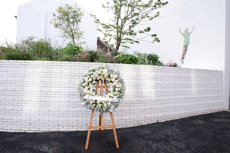 Le jardin-mémorial en hommage aux victimes de Marc Dutroux  inauguré le 19 septembre 2023 à Charleroi, en Belgique, à la place de la maison où ce dernier a séquestré plusieurs fillettes et adolescentes ( AFP / Kenzo TRIBOUILLARD )