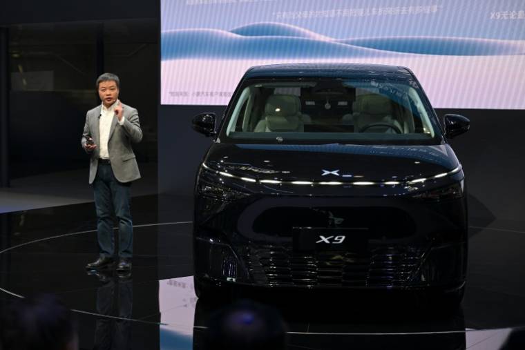 He Xiaopeng, directeur général du constructeur chinois de véhicules électriques XPeng, à l'ouverture du salon automobile Auto China, le 25 avril 2024 à Pékin ( AFP / Jade Gao )