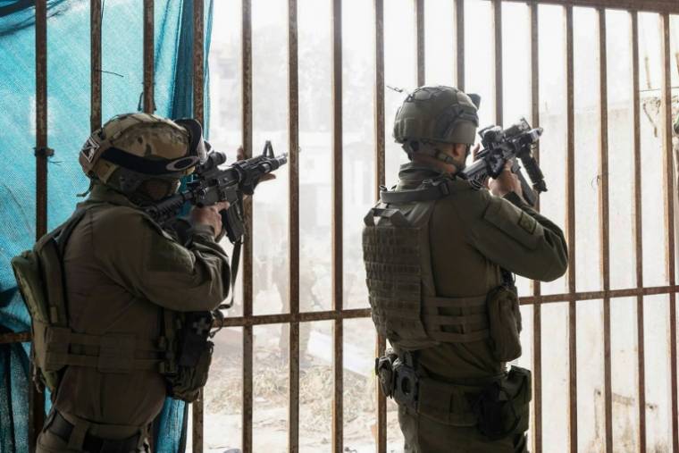 Soldats israéliens en opération dans la bande de Gaza. Photo distribuée par l'armée israélienne le 27 mars 2024 ( Israeli Army / - )