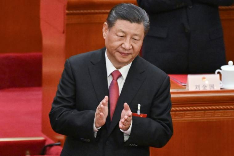 Le président chinois Xi Jinping, le 11 mars 2024 à Pékin ( AFP / GREG BAKER )