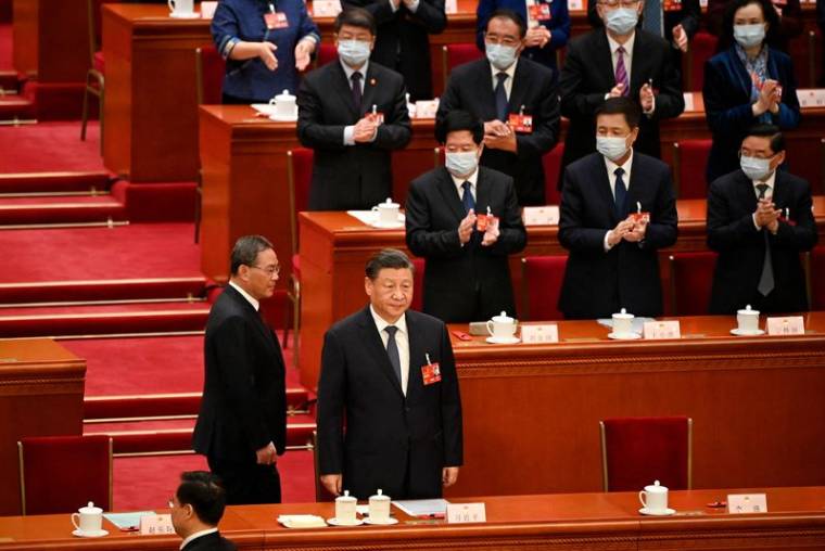 Le président chinois Xi Jinping et Li Qiang, membre du comité permanent du Politburo,lors de la quatrième session plénière de l'Assemblée populaire nationale (APN) à Pékin, en Chine