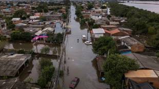 Vue aérienne montrant le quartier inondé d'Harmonia dans la ville de Canoas, dans l'Etat du Rio Grande do Sul, au Brésil, le 13 mai 2024 ( AFP / NELSON ALMEIDA )