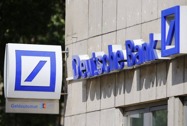 A logo of a branch of Germany's Deutsche Bank is seen in Cologne