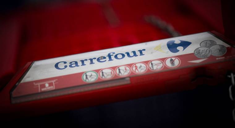 Les enseignes Match et Cora survivront-elles, ou seront-elles absorbées par Carrefour ? (© AFP)