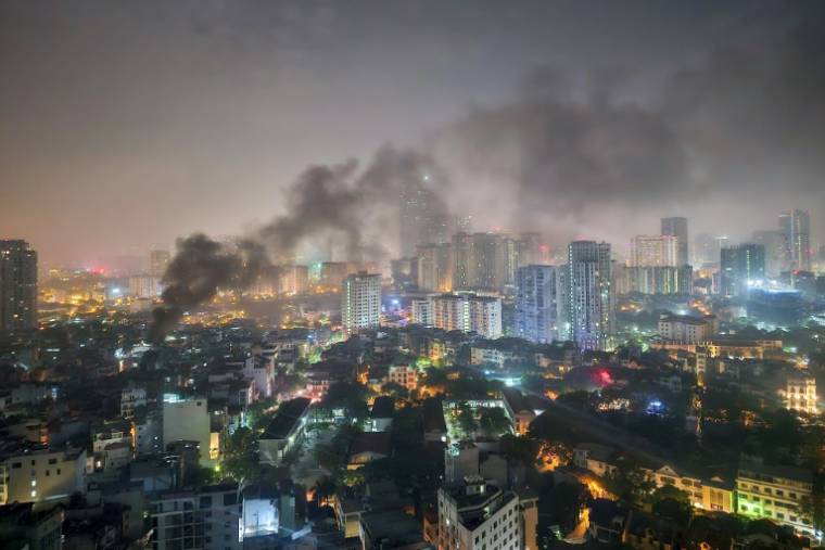 Incendie dans un immeuble d'appartements à Hanoï, le 24 mai 2024 au Vietnam ( AFP / STR )