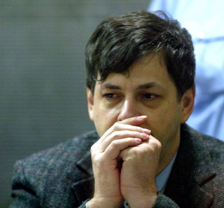 Marc Dutroux lors de son procès, le 15 mars 2004 à Arlon, en Belgique ( POOL / DIDIER BAUWERAERTS )