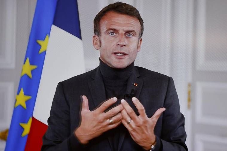 Emmanuel Macron s'adressant aux Français au sujet du Conseil National de la Refondation à Paris, le 3 octobre 2022. ( AFP / Ludovic MARIN )