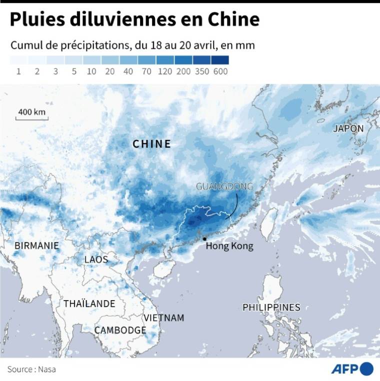 Pluies diluviennes en Chine ( AFP / Nicholas SHEARMAN )