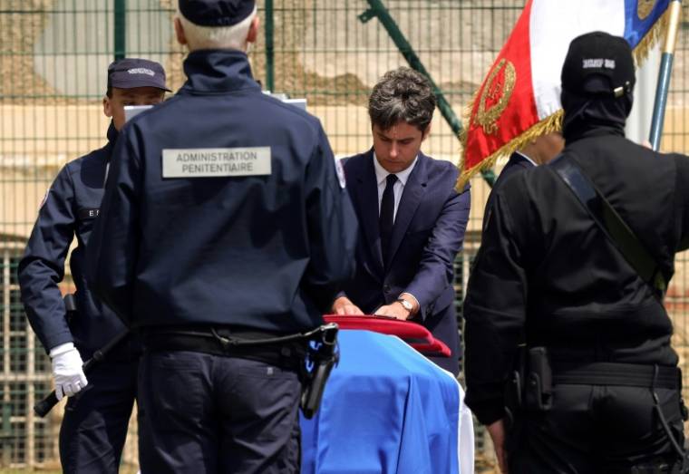 Hommage national à Caen le 22 mai 2024, en présence du Premier ministre Gabriel Attal, aux deux surveillants pénitentiaires tués le 14 mai à Incarville (Eure) ( POOL / Teresa Suarez )