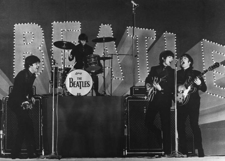 Les Beatles lors d'un concert au Budokan à Tokyo le 30 juin 1966 ( JIJI PRESS / JIJI PRESS )