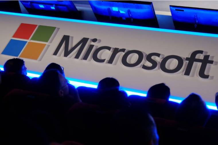 Microsoft, qui publie ses résultats trimestriels jeudi, a annoncé près de 10 milliards de dollars d'investissements dans l'intelligence artificielle (IA) à l'étranger ces derniers mois ( AFP / Sam YEH )