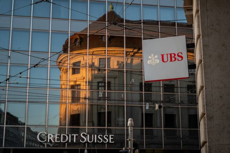 UBS a finalisé le rachat de Credit Suisse ( AFP / FABRICE COFFRINI )