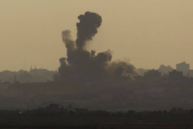 Smoke rises after an explosion in the northern Gaza Strip as seen from the Israeli border