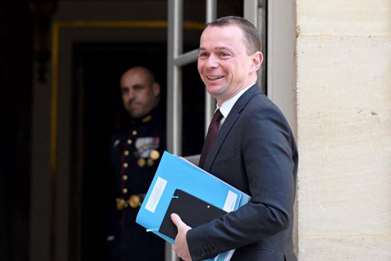Le ministre du Travail Olivier Dussopt à Matignon le 17 mai 2023. ( AFP / EMMANUEL DUNAND )