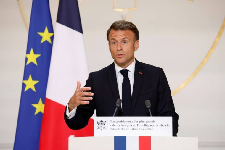 Le président Emmanuel Macron lors d'un sommet sur l'intelligence artificielle organisé à l'Élysée, le 21 mai 202 à Paris ( POOL / Yoan VALAT )