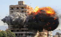 Une frappe aérienne israélienne sur un immeuble du quartier de Chiyah, au sud de Beyrouth, le 22 novembre 2024 au Liban ( AFP / - )