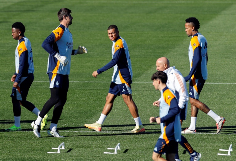 Kylian Mbappé (c) lors d'une session d'entraînement avec ses coéquipiers du Real Madrid, le 18 octobre 2024 à Valdebebas, près de Madrid ( AFP / OSCAR DEL POZO )