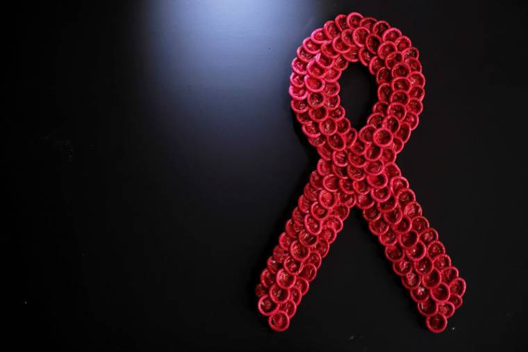 AU MOINS 14,5 MILLIARDS D'EUROS POUR LE FONDS MONDIAL CONTRE LE SIDA, ANNONCE MACRON