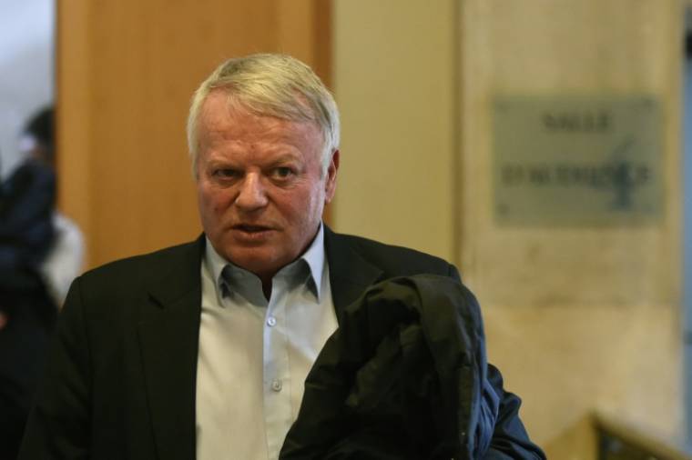 Christian Lefèvre, ancien directeur général du groupe Bourbon, quitte le tribunal de Marseille, le 18 mars 2019 ( AFP / Boris HORVAT )