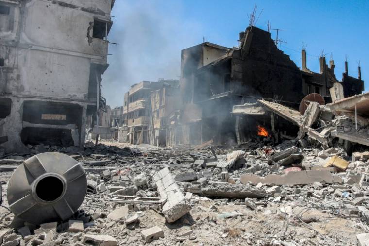 Des bâtiments détruits après un bombardement israélien sur le quartier de Zeitoun, à Gaza, le 9 mai 2024 ( AFP / - )