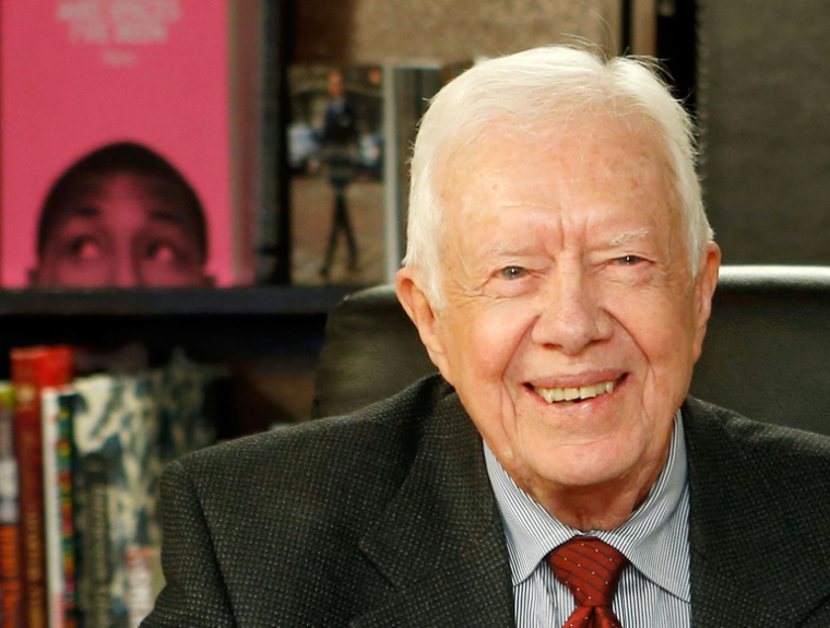 L'ancien président américain Jimmy Carter pose pour une photo à New York, le 25 mars 2014 ( GETTY IMAGES NORTH AMERICA / Jemal Countess )