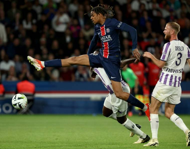 L'attaquant du Paris Saint-Germain Bradley Barcola lors du match contre Toulouse le 12 mai 2024 au Parc des Princes à Paris ( AFP / FRANCK FIFE )