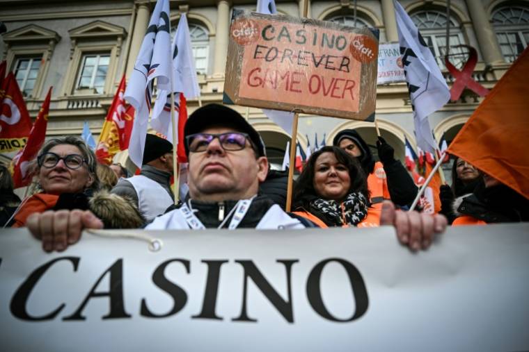 Casino employees demonstrate in front of the group's headquarters in Saint-Etienne, December 5, 2023. (AFP / OLIVIER CHASSIGNOLE)