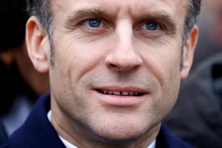 Le président français Emmanuel Macron assiste à la cérémonie d'inauguration du village olympique de Paris 2024 à Saint-Denis, au nord de Paris, le 29 février 2024 ( POOL / Ludovic MARIN )