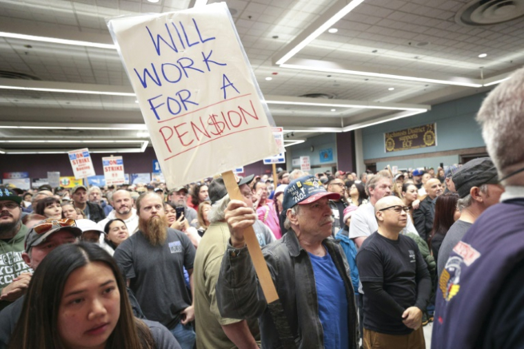 Des grévistes de l'avionneur Boeing, le 15 octobre 2024 à Seattle (nord-ouest) ( AFP / Jason Redmond )