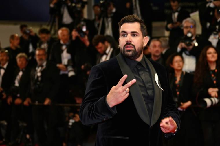 L'acteur français Artus arrive à la projection du film "Un p'tit truc en plus" lors de la 77e édition du Festival de Cannes, dans le sud de la France, le 19 mai 2024 ( AFP / CHRISTOPHE SIMON )