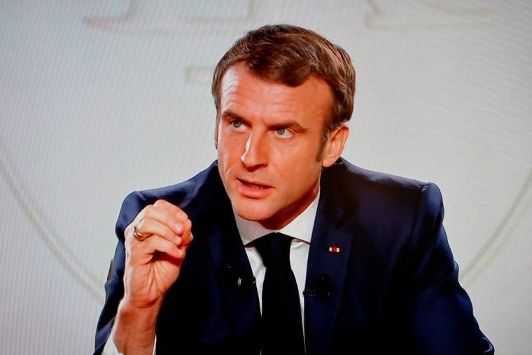 Emmanuel Macron à Paris, le 15 décembre 2021. ( AFP / LUDOVIC MARIN )
