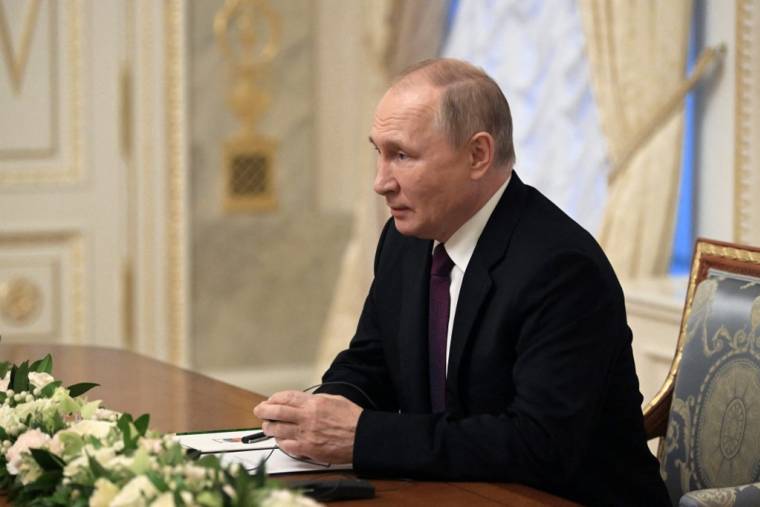 Vladimir Poutine à Saint-Petersbourg, en Russie, le 11 octobre 2022. ( SPUTNIK / PAVEL BEDNYAKOV )