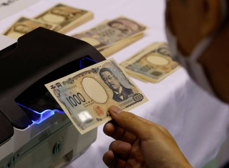 Un billet de yen japonais dans une imprimerie de l'Office national d'impression des billets de la Banque du Japon, à Tokyo