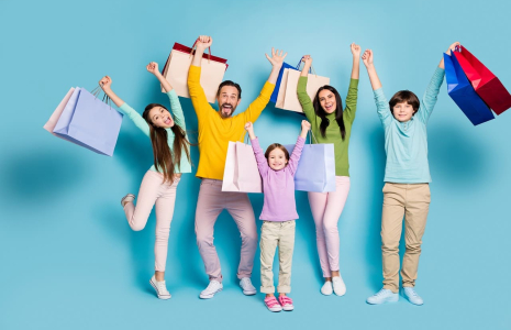 (Crédits photo : Adobe Stock - Famille heureuse de faire des affaires sur The Corner)