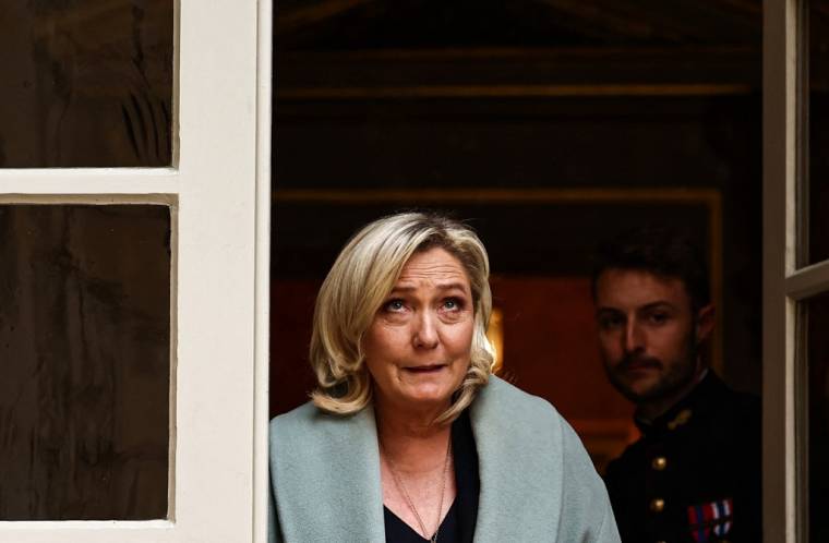 Marine Le Pen à Paris, le 11 avril 2023. ( AFP / ANNE-CHRISTINE POUJOULAT )
