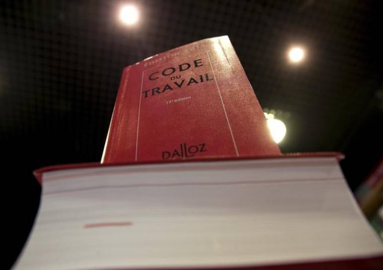 Copies of French Labour Code are displayed in a specialized bookshop in Paris