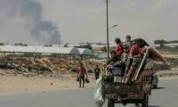Des Palestiniens fuient  Rafah, dans le sud de la bande de Gaza, le 29 mai 2024 ( AFP / Bashar TALEB )