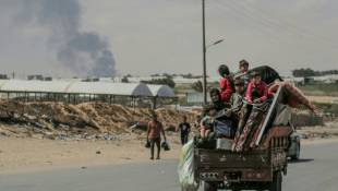 Des Palestiniens fuient  Rafah, dans le sud de la bande de Gaza, le 29 mai 2024 ( AFP / Bashar TALEB )