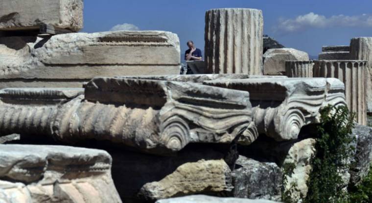 L'Acropole à Athènes, la Grèce attire 22,5 millions de touristes par an (©Louisa Gouliamaki / AFP)