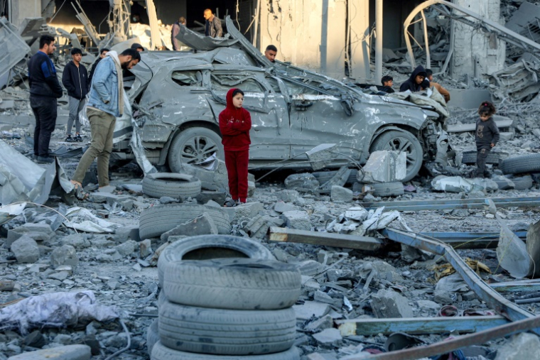 Destructions à Gaza-ville, après une frappe israélienne sur un immeuble d'habitation, le 14 janvier 2025 ( AFP / Omar AL-QATTAA )