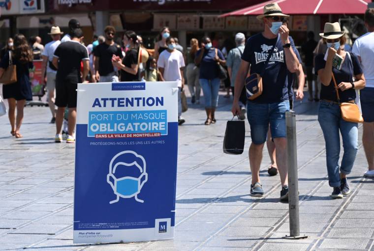 Port du masque obligatoire dans le centre de Montpellier.  ( AFP / PASCAL GUYOT )