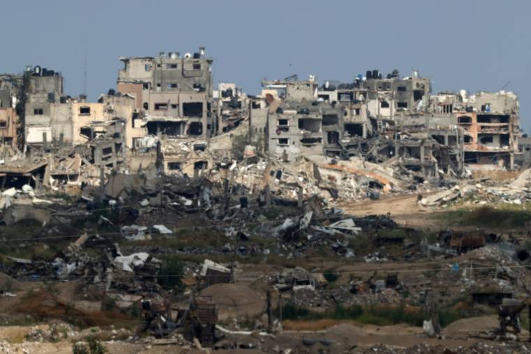 Des bâtiments détruits par les bombardements israéliens dans la bande de Gaza, le 10 avril 2024 ( AFP / JACK GUEZ )
