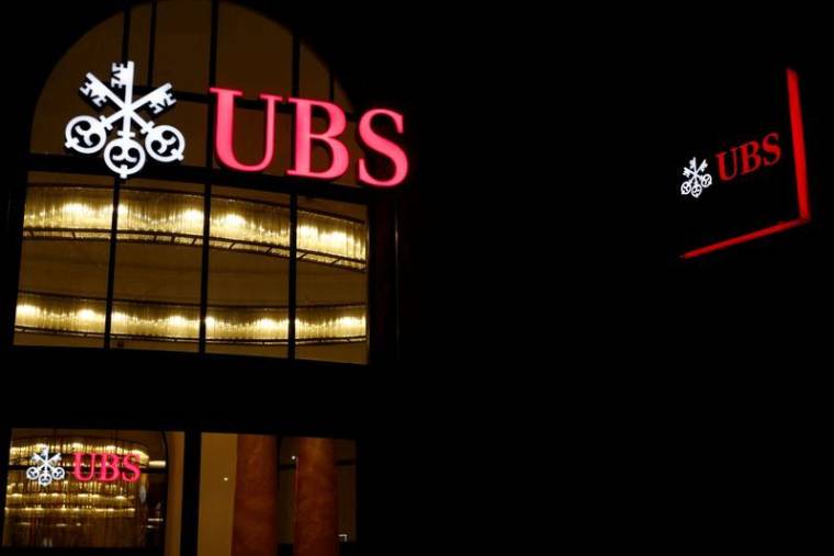 UBS: RÉSULTATS EN BAISSE MAIS MEILLEURS QUE PRÉVU AU T2