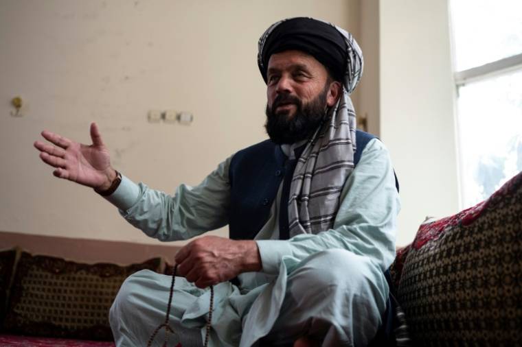 Ahmad Shah Lakankhel, qui a joué le rôle de médiateur sur instruction du ministre de l'Intérieur des talibans, lors d'un entretien avec l'AFP dans le village de Lakan, à Khost, le 21 avril 2024 en Afghanistan ( AFP / Wakil KOHSAR )