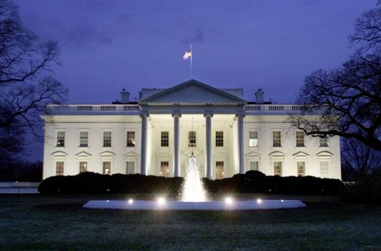 NORTH PORTICO OF THE WHITE HOUSE AS SEEN AT NIGHT FROM PENNSYLVANIA AVENUE.