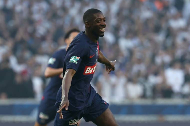 L'attaquant du PSG Ousmane Dembélé ouvre la marque contre Lyon, le 25 mai 2024 à Villeneuve-d'Ascq ( AFP / FRANCK FIFE )