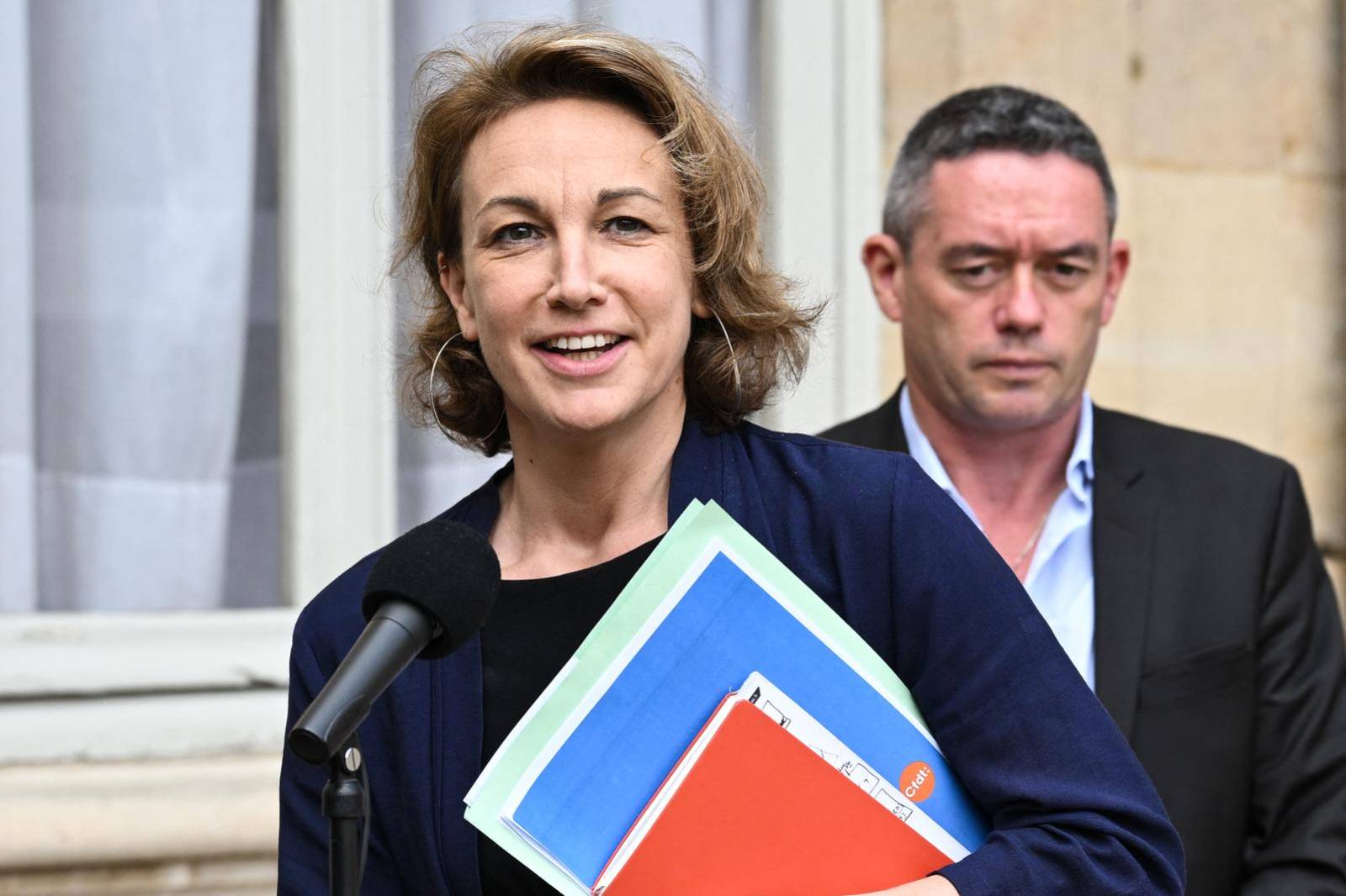 Marylise Léon, secrétaire générale de la CFDT, et Yvan Ricordeau à Paris, le 12 juillet 2023. ( AFP / BERTRAND GUAY )