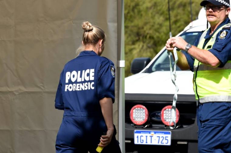La police scientifique arrive sur une scène de crime dans l'ouest de la ville de Perth le 10 septembre 2018 ( AFP / Greg Wood )