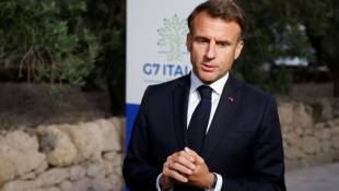 Le président Emmanuel Macron s'exprime le 14 juin 2024 à l'occasion du G7 à Bari, en Italie ( AFP / Ludovic MARIN )